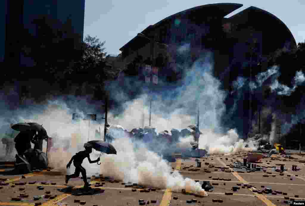 Protesters clash with police outside Hong Kong Polytechnic University (PolyU) in Hong Kong.
