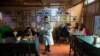 In Indian Capital, People Return to Restaurants to Savor Normalcy 