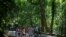 Visitors stroll and pedal at the Tijuca National Park in Rio de Janeiro, Feb. 28, 2021. 