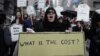 Protestors chant during an Occupy Wall Street march, New York, September 17, 2012.