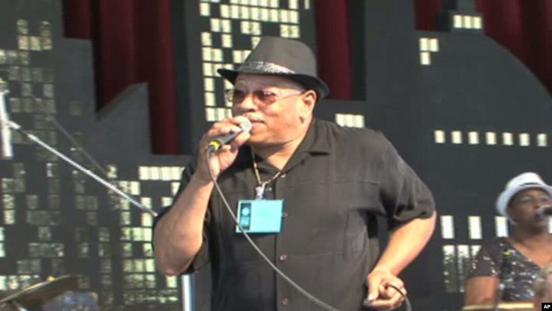 The Funk Brothers band, a famous R&B group from the 1960s, performs at the Smithsonian Folklife Festival.