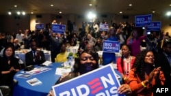 FILE - Attendees cheer as US President Joe Biden speaks during the South Carolina’s First in the Nation Dinner at the South Carolina State Fairgrounds in Columbia, South Carolina, on January 27, 2024.