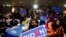 FILE - Attendees cheer as US President Joe Biden speaks during the South Carolina’s First in the Nation Dinner at the South Carolina State Fairgrounds in Columbia, South Carolina, on January 27, 2024.