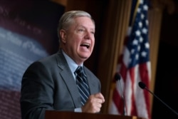 Senate Judiciary Committee Chairman Lindsey Graham, R-S.C., denounces a report by the Justice Department's internal watchdog, on Capitol Hill in Washington, Dec. 9, 2019.