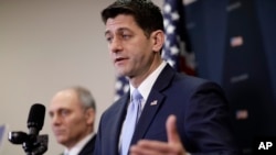 Speaker of the House Paul Ryan, R-Wis., joined at left by Majority Whip Steve Scalise, R-La., answers questions at a news conference as he defends a vote by Republicans on the House intelligence committee to release a classified memo on the Russia investigation, at the Capitol in Washington, Jan. 30, 2018. Ryan told reporters that "there may have been malfeasance at the FBI by certain individuals." 
