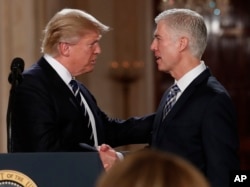 President Donald Trump nominates Neil Gorsuch (right) less than two weeks after becoming president.