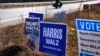 Campaign signs for Republican presidential nominee former President Donald Trump and Democratic presidential nominee Vice President Kamala Harris, line a highway, Oct. 31, 2024, in Barrington, N.H.