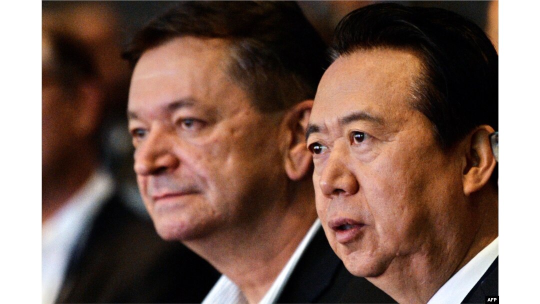 FILE - Interpol vice president Alexander Prokopchuk (L) and Meng Hongwei, then-president of Interpol, are seen at the opening of the Interpol World Congress, in Singapore, July 4, 2017.