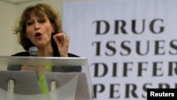 FILE - Agnes Callamard, a United Nations Special Rapporteur on extrajudicial, summary or arbitrary executions, delicers a statement during a "Drug issues, Different Perspectives" forum at a compound of University of the Philippines in Quezon city, metro Manila.