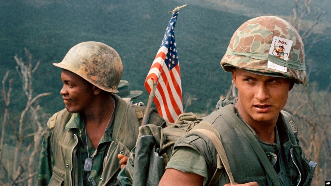 U.S. Marines unload equipment at a landing zone in Vietnam on December 1969. 