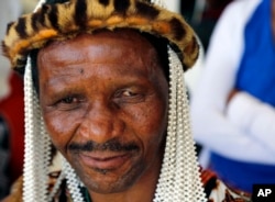 FILE - A traditional healer attends Freedom Day celebrations in Kwa-Thema Township, near Johannesburg, Saturday April 27, 2019.