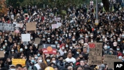 Thousands of protesters gather in Sydney, June 6, 2020, to support the movement of U.S. protests over the death of George Floyd.