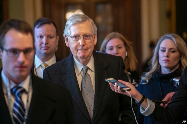 Senate Majority Leader Mitch McConnell, R-Ky., leaves the chamber after speaking about his plan to move a 1,300-page spending measure, which includes $5.7 billion to fund President Donald Trump's proposed wall along the U.S.-Mexico border, Jan. 22, 2019.