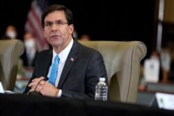FILE - In this July 10, 2020, file photo Defense Secretary Mark Esper speaks during a briefing in Doral, Fla.