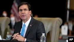 FILE - In this July 10, 2020, photo Defense Secretary Mark Esper speaks during a briefing in Doral, Fla. 