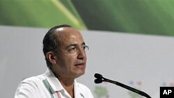 ປະທານາທິບໍດີ Felipe Calderon ແຫ່ງເມັກຊິໂກ ກ່າວໄຂ ກອງປະຊຸມວ່າດ້ວຍການປ່ຽນແປງຂອງດິນຟ້າອາກາດ ທີ່ເມືອງ Cancun, ວັນທີ 29 ພະຈິກ 2010.