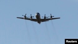 A Royal Australian Air Force AP-3C Orion returns from a search for MalaysianA Royal Australian Air Force AP-3C Orion returns from a search for Malaysian Airlines Flight MH370 over the Indian Ocean, at RAAF Base Pearce, north of Perth March 21, 2014.