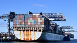 Containers are loaded onto cargo ships at Port Botany in Sydney on June 4, 2021.