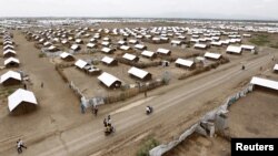 An aerial view shows recently constructed houses at the Kakuma refugee camp in Turkana District, northwest of Kenya's capital Nairobi, June 20, 2015.