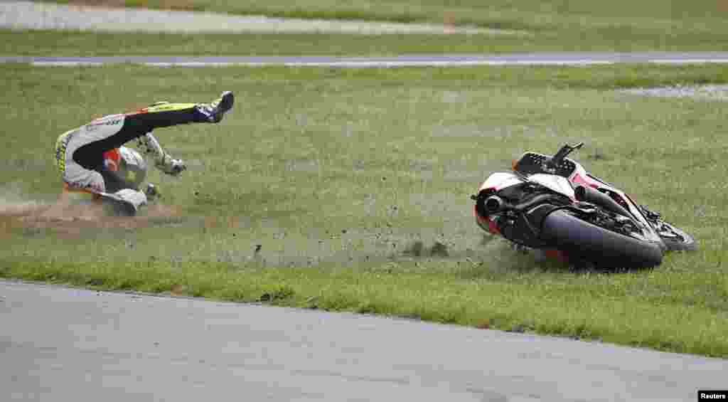 Pramac Racing MotoGP rider Andrea Iannone of Italy crashes out of the Australian Grand Prix on Phillip Island, Australia.