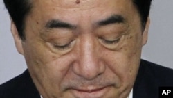 Japan's Prime Minister Naoto Kan attends a general meeting of his ruling Democratic Party of Japan (DPJ) lawmakers at the parliament building in Tokyo, August 26, 2011