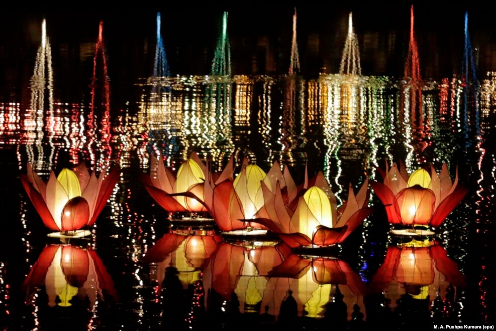 Lotus-shaped illuminated lanterns float during Vesak celebrations on Beira Lake in Colombo, Sri Lanka, to mark the birth, enlightenment and demise of Buddha.