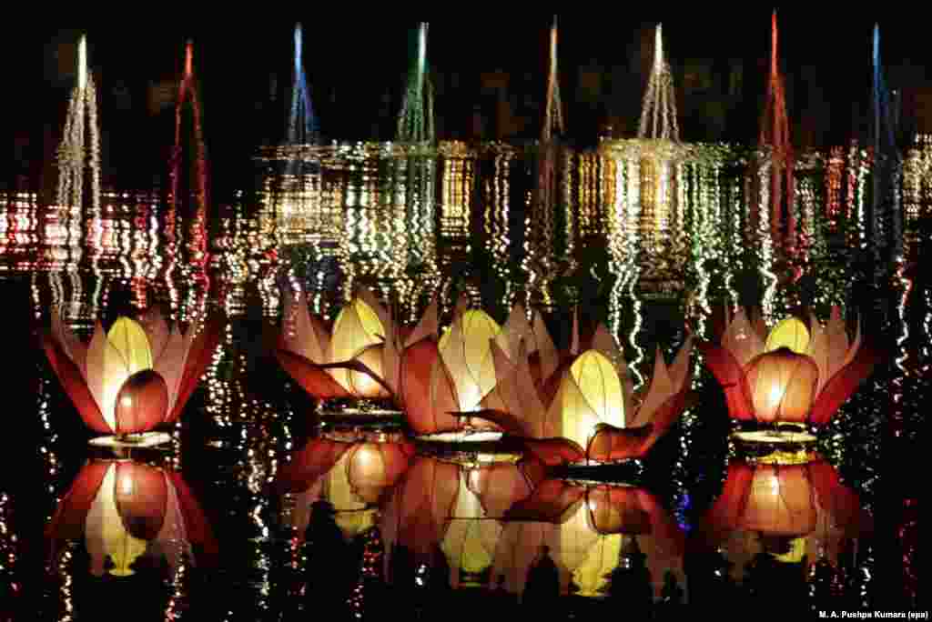 Lotus-shaped illuminated lanterns float during Vesak celebrations on Beira Lake in Colombo, Sri Lanka, to mark the birth, enlightenment and demise of Buddha.