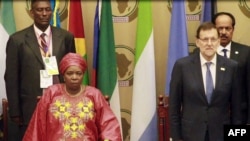 A video grab taken from AFP footage on June 26, 2014 shows African Union (AU) President Nkosazana Dlamini-Zuma and Spanish Prime Minister Mariano Rajoy attending the opening of an African Union (AU) summit in Malabo, Equatorial Guinea, on June 26, 2014.