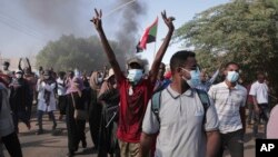 Sudanese protest against the military takeover, which upended the country’s fragile transition to democracy, in Khartoum, Nov. 21, 2021.