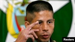 FILE - Colombian police officer John Frank Pinchao, who escaped after nine years of rebel captivity, attends a news conference in Bogota, May 22, 2007. 