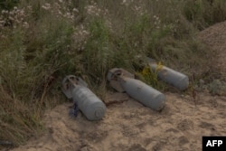 Bombs lie in the area of a destroyed border crossing point with Russia, in the Sumy region of Ukraine, on Aug. 14, 2024.