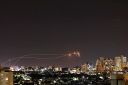 Iron Dome anti-missile system fires interception missiles as rockets are launched from Gaza toward Israel as seen from the city of Ashkelon, Israel, Nov. 1, 2019.