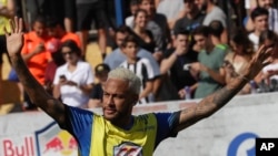 Brazilian soccer player Neymar acknowledges fans during the Neymar Jr's Five youth soccer tournament in Praia Grande, Brazil, July 13, 2019.