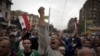 Protesters chant anti-Muslim Brotherhood slogans during a rally in front of the presidential palace, in Cairo, Egypt, December 4, 2012.