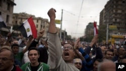 Protesters chant anti-Muslim Brotherhood slogans during a rally in front of the presidential palace, in Cairo, Egypt, December 4, 2012.
