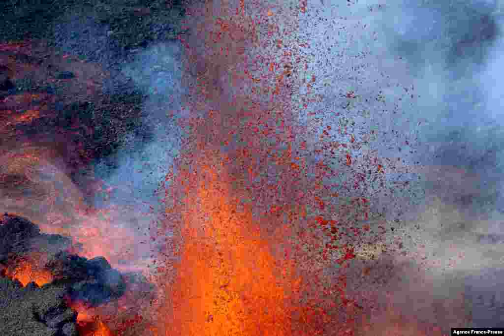 This aerial photograph taken on Dec. 22, 2021 shows the erupting Piton de la Fournaise volcano on the French Indian Ocean island of Reunion.