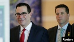 U.S. Treasury Secretary Steven Mnuchin is seen as he and a U.S. delegation member for trade talks with China, leave a hotel in Beijing, China, May 3, 2018.