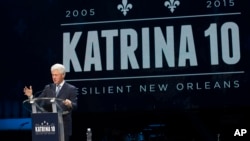 Former President Bill Clinton speaks at an event marking the 10-year anniversary of Hurricane Katrina in New Orleans, Aug. 29, 2015.