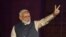 Indian Prime Minister Narendra Modi gestures toward his supporters after the election results at Bharatiya Janata Party (BJP) headquarter in New Delhi, May 23, 2019.