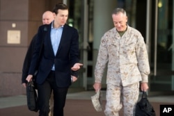 President Donald Trump's son-in-law and senior advisor Jared Kushner (L) speaks with Marine Corps Gen. Joseph F. Dunford Jr., chairman of the Joint Chiefs of Staff, before departing for Iraq from Ramstein Air Base, Germany, April 3, 2017.