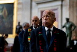 Rep. John Lewis, D-Ga., prepares to pay his respects to Rep. Elijah Cummings, D-Md., who lies in state during a memorial service at the U.S. Capitol Hill in Washington, Oct. 24, 2019.