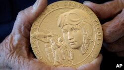 FILE - A Congressional Gold Medal honoring U.S. women Airforce Service Pilots, is seen following a presentation ceremony on Capitol Hill, in Washington, March 10, 2010.