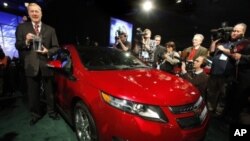 GM's Thomas Stephens accepts the North American Car of the Year Award for the Chevrolet Volt at the North American International Auto Show in Detroit, Michigan on Jan. 10, 2011.