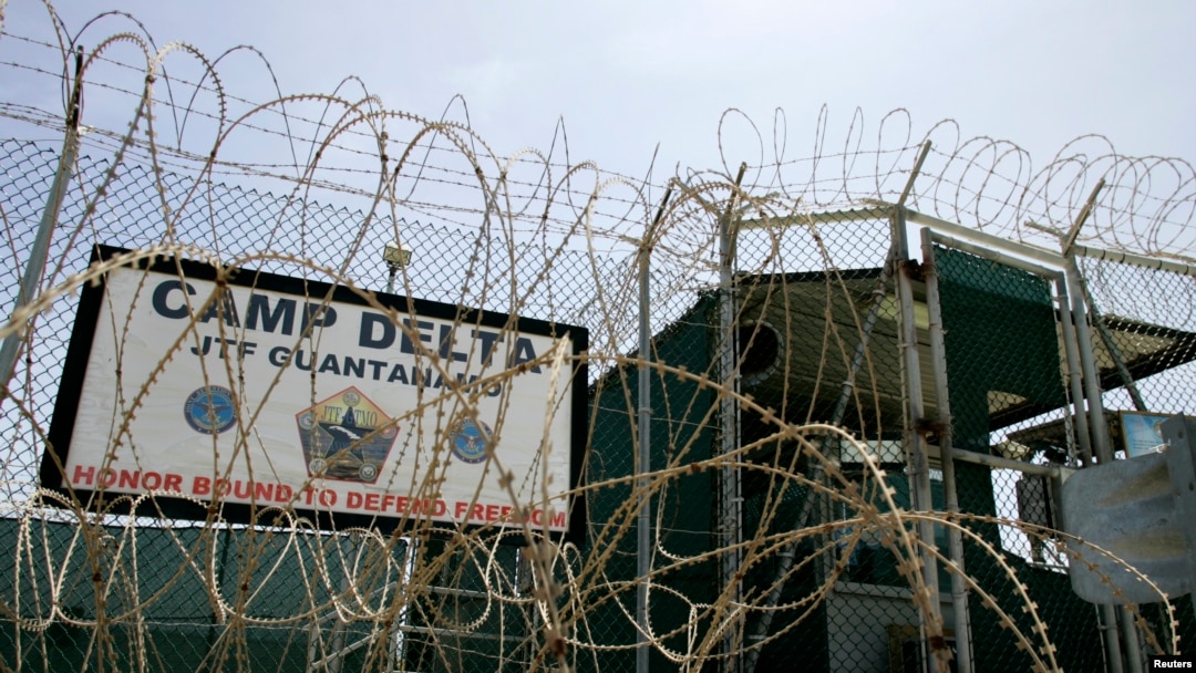 FILE - The front gate of Camp Delta is shown at the Guantanamo Bay Naval Station in Guantanamo Bay, Cuba.