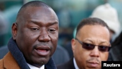 Benjamin Crump, left, and Anthony Gray, attorneys for the family of shooting victim Michael Brown, speak about the grand jury process in Clayton, Missouri, Nov. 13, 2014.
