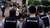 اجتماع مردم و تدابیر شدید امنیتی در اطراف دادگاه طرفداران دموکراسی در هنگ کنگ