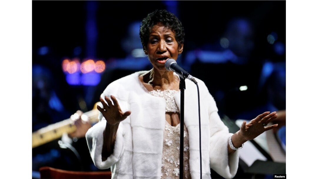 FILE - Aretha Franklin performs during the commemoration of the Elton John AIDS Foundation 25th year fall gala at the Cathedral of St. John the Divine in New York City, Nov. 7, 2017.