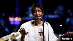 FILE - Aretha Franklin performs during the commemoration of the Elton John AIDS Foundation 25th year fall gala at the Cathedral of St. John the Divine in New York City, in New York, Nov. 7, 2017. 