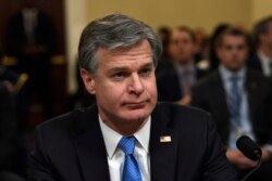 FILE - FBI Director Christopher Wray testifies before the House Homeland Security Committee on Capitol Hill in Washington, Oct. 30, 2019, during a hearing on domestic terrorism.