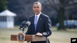 President Barack Obama makes a statement on Ukraine, March 20, 2014, on the South Lawn at the White House in Washington.